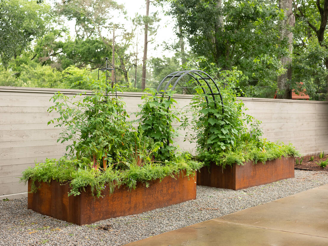 The Kelly Package: corten steel raised beds with an obelisk trellis and arch